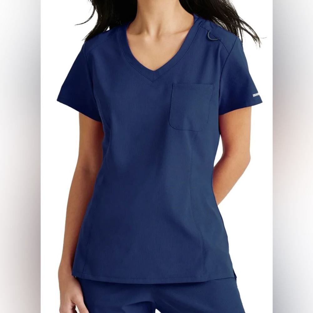 SOLD!!!!! 
BNWT Women’s Sketchers Scrub Top size S